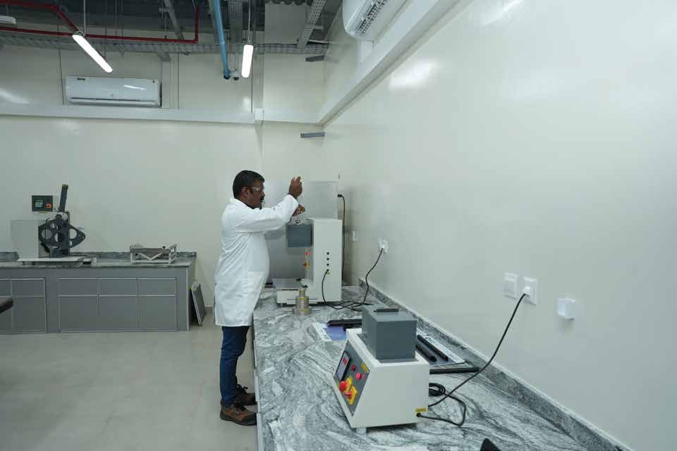 Vivasvaan technician carrying out material testing on Marley product